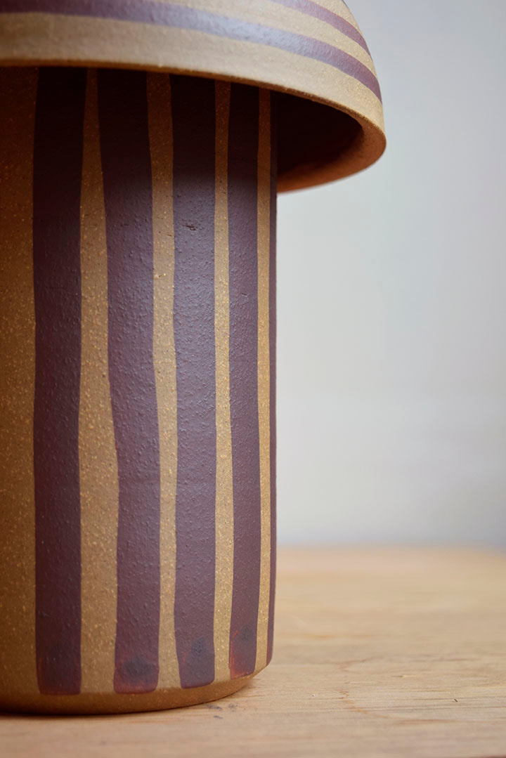 detail of a ceramic vase with stripes handmade by belinda wiltshire